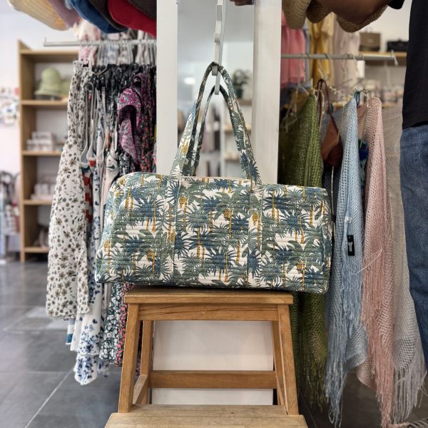 BOLSA DE VIAJE ESTAMPADO TROPICAL
